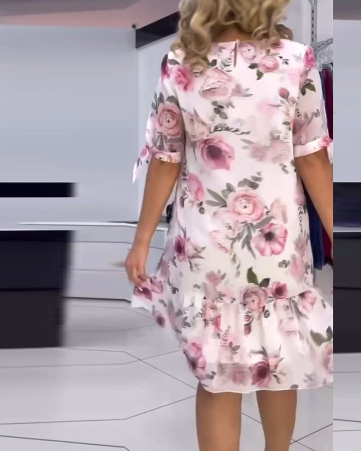 Blommig elegant klänning med rund hals