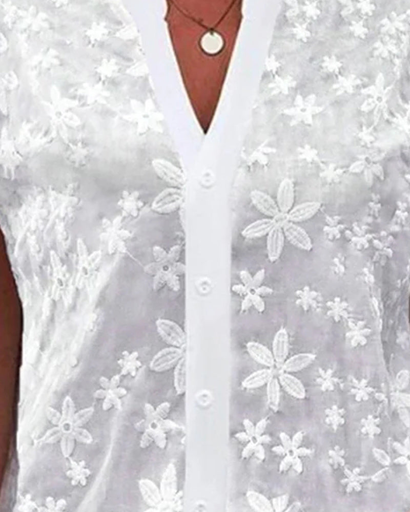 Blus med kort ärm och V-ringning